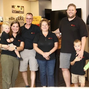 The Hearth & Home family on the showroom floor in East Syracuse